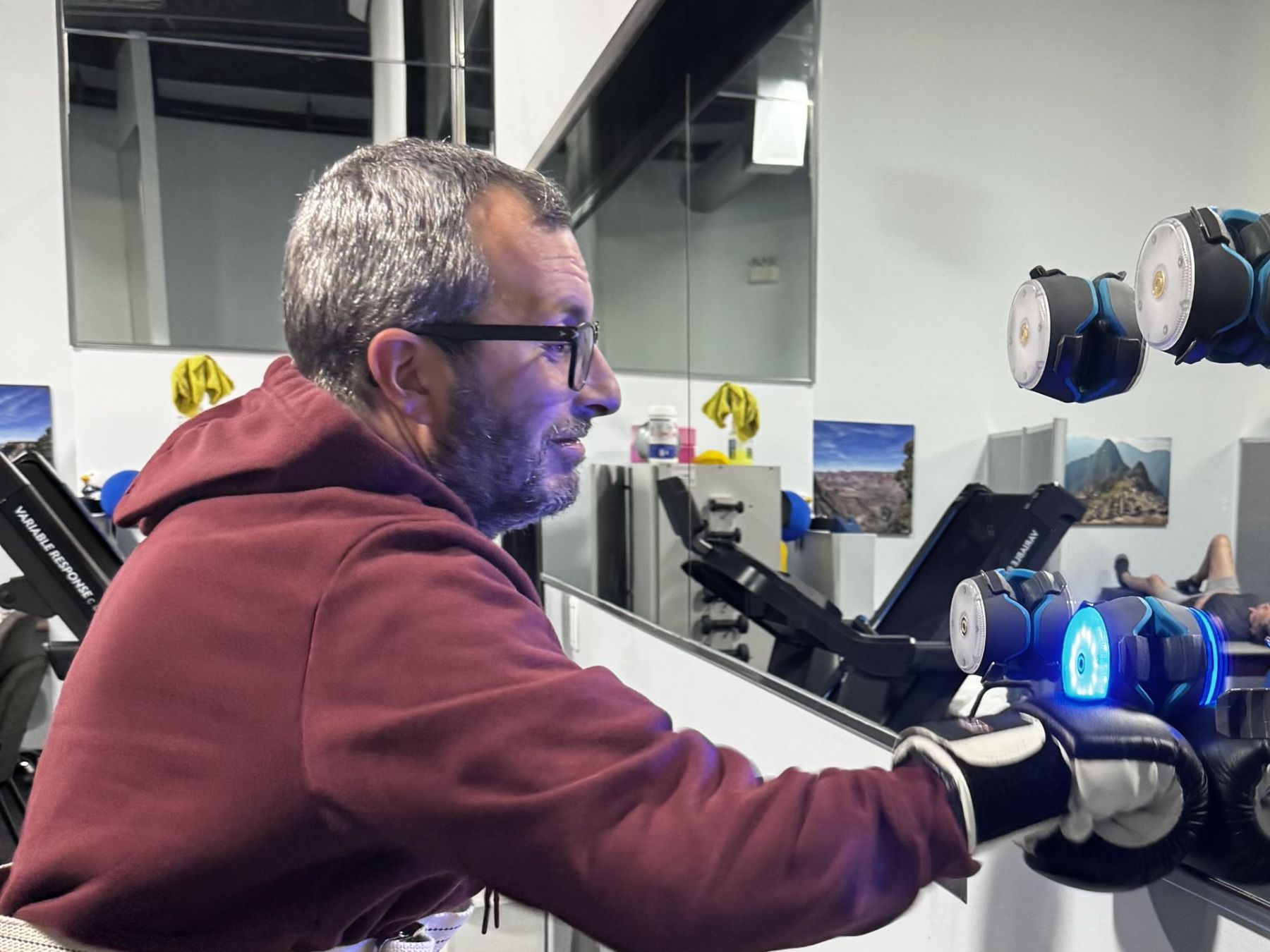 Adult client training with robotic arm equipment
